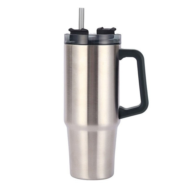 stanley quencher flowstate vacuum insulated tumbler thermos with handle and straw silver color