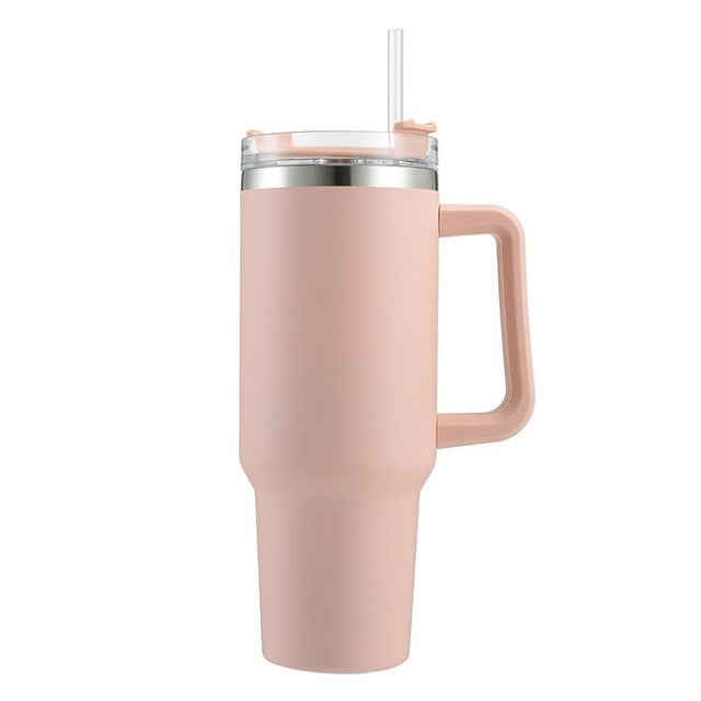 stanley quencher flowstate vacuum insulated tumbler thermos with handle and sand color