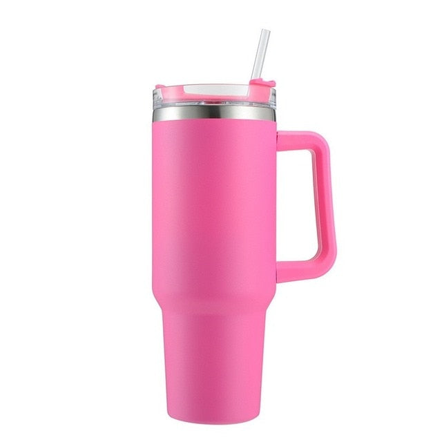 stanley quencher flowstate vacuum insulated tumbler thermos with handle and straw pink color