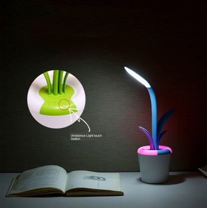 A rechargeable VP9 Portable Table Lamp in a signal green color that is dimmable and illuminates for up to 11 hours.